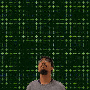 a man stands in front of a green background with the number 29 on it