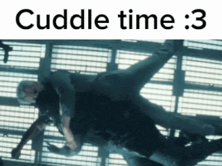 a picture of two men hugging with the words cuddle time : 3
