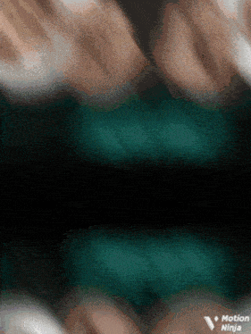 a close up of a person 's hands with the words motion ninja on the bottom right