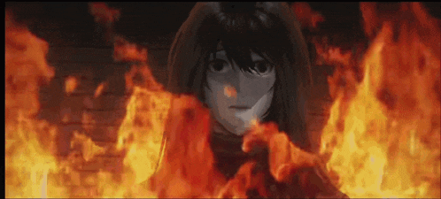 a girl is surrounded by flames and smoke