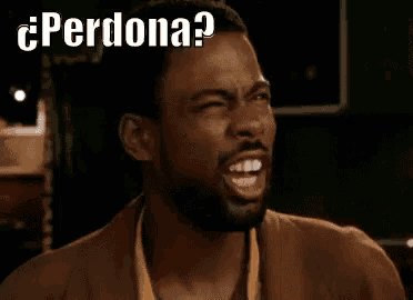 a man with a beard is making a funny face with his mouth open and the words `` perdona '' written above him .