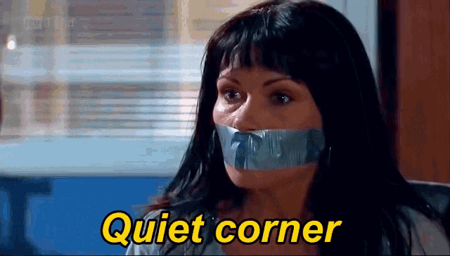 a woman with tape on her mouth and the words quiet corner