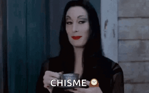 a woman is holding a cup of coffee and a clock in her hands .