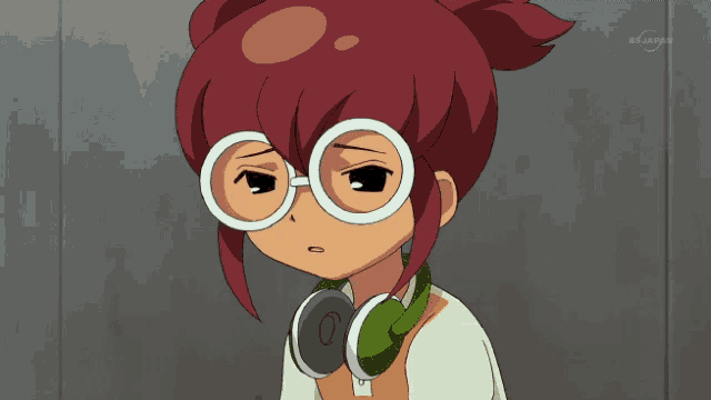 a cartoon of a girl with glasses and headphones shows a channel called tv japan