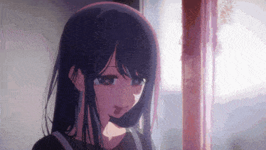 a close up of a girl with long black hair
