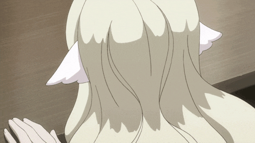 a close up of a person 's hair with a white ear on it