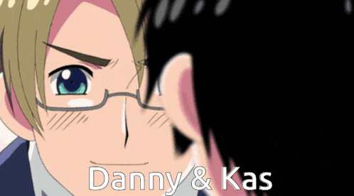 a man with glasses looks at another man with the words danny & kas written on the bottom
