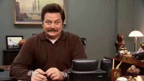 Cheerful Ron Swanson GIF - Parks And Rec Ron Swanson Nick Offerman GIFs