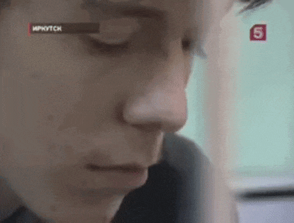 a close up of a man 's face with his eyes closed and his nose visible .