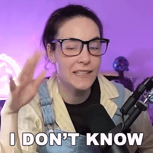 a woman wearing glasses and overalls says i do n't know