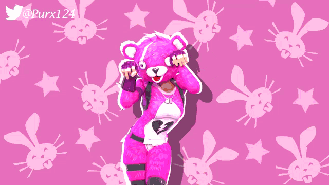 a pink teddy bear with a broken heart on her chest