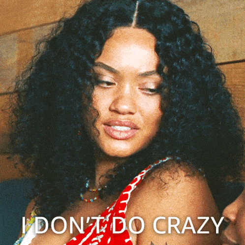 a woman with curly hair has the words " i don 't do crazy " next to her