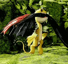 a yellow and black dragon is standing in the grass with its wings outstretched .