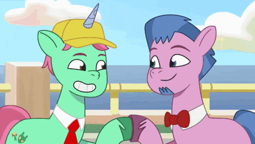 a couple of ponies standing next to each other with one wearing a hat