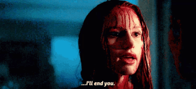 a woman with blood coming out of her face says i 'll end you