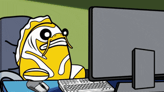 a cartoon character is sitting in front of a computer monitor