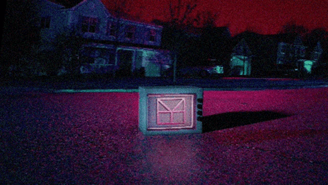 a television with a red envelope on it