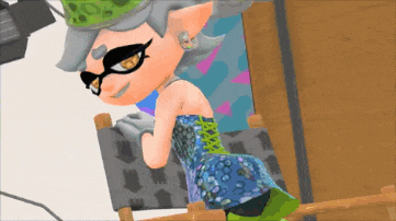a cartoon character is sitting on a chair and wearing a blue dress