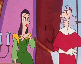 a man and a woman are standing next to each other in a room .