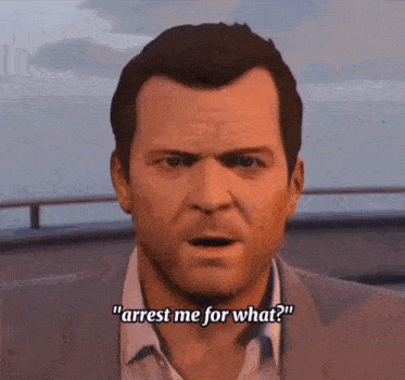 a man in a suit says " arrest me for what ? "