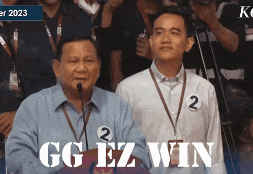 two men standing next to each other with the words gg ez win written on the bottom