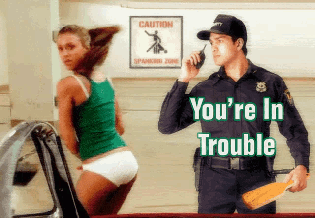 a police officer talking on a walkie talkie next to a woman in a spanking zone