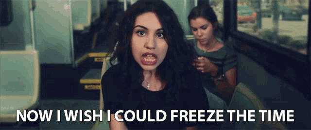 a woman on a bus with the words now i wish i could freeze the time behind her