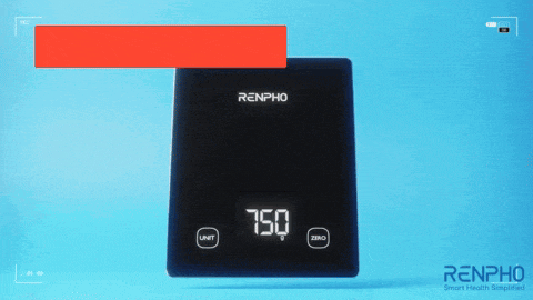 a black renpho scale displays the weight of 750 grams