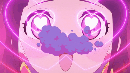 a close up of a girl 's face with a heart in her eyes