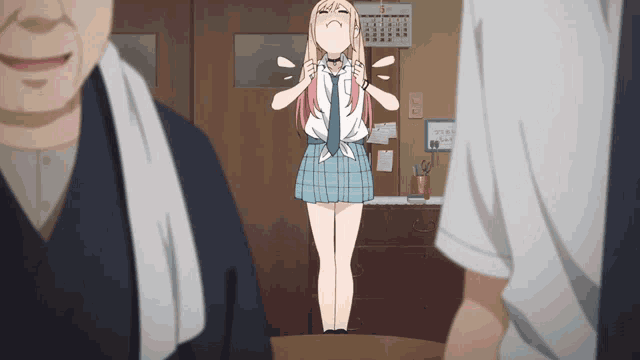 a girl in a plaid skirt is standing in front of a man with a towel
