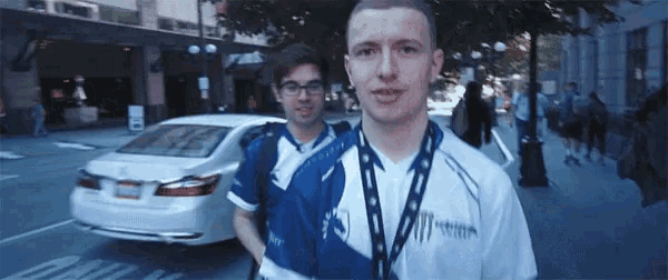 a man with a lanyard around his neck that says ' ii ' on it