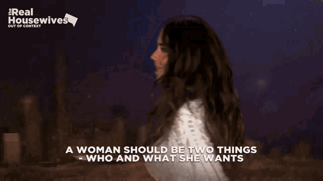 a poster for real housewives shows a woman in a white top