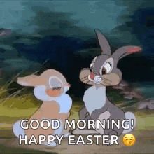 two rabbits are sitting next to each other in a field and saying good morning ! happy easter .