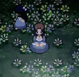 a girl is sitting in the middle of a field of flowers .
