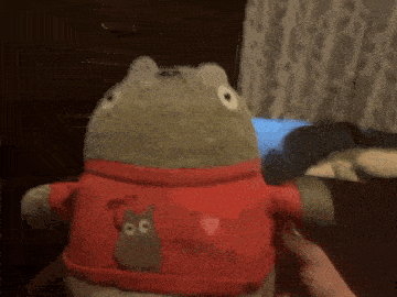 a stuffed animal with a red shirt that says i love tokyo