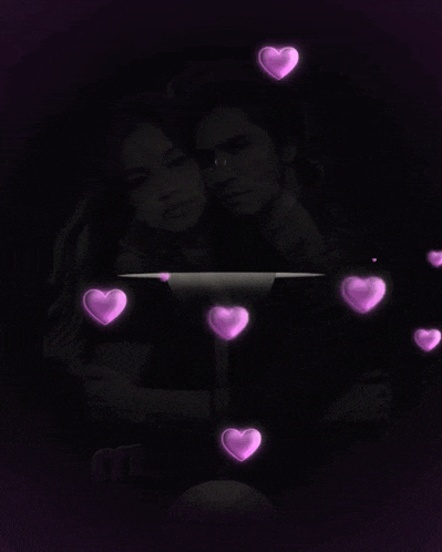 a black and white photo of a man and woman hugging with the words mayluna seiya in red letters