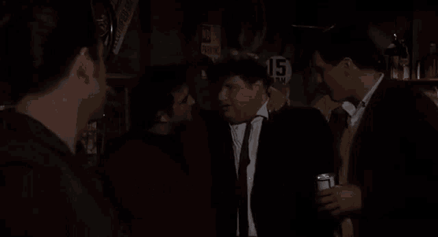a group of men are talking and one of them says " my advice to you "