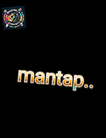 a woman sitting at a table with a phone and a sign that says " mantas "