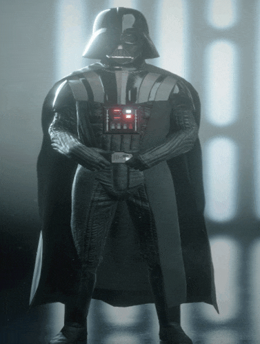 darth vader from star wars stands in front of a row of lights
