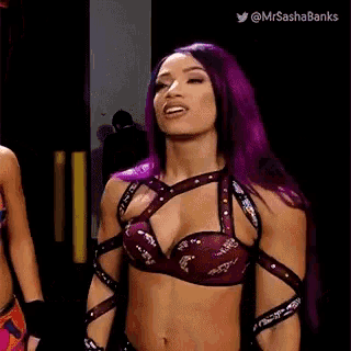 a woman with purple hair is standing next to another woman and says " you mean when alexa took a walk . "