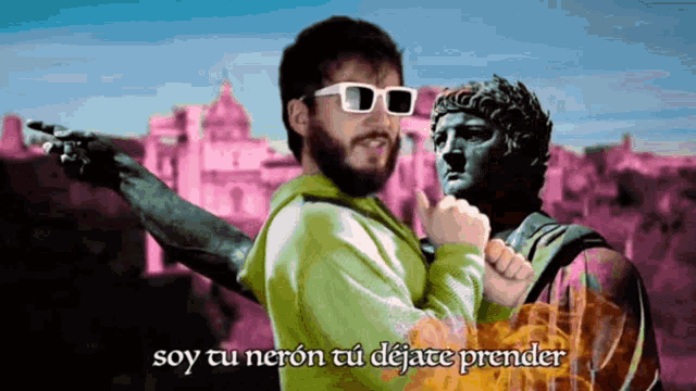 a man wearing 3d glasses stands next to a statue with the words soy tu neron tu dejate prender