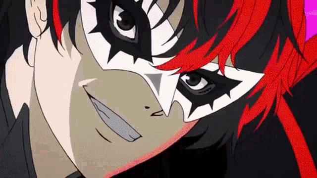 a close up of a person wearing a clown mask with red hair .