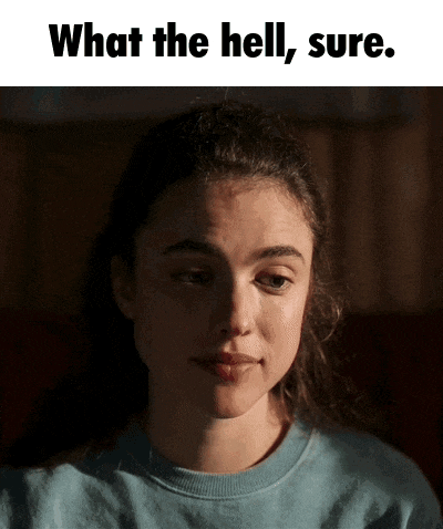 a woman in a blue shirt is making a funny face with the words " what the hell sure " above her