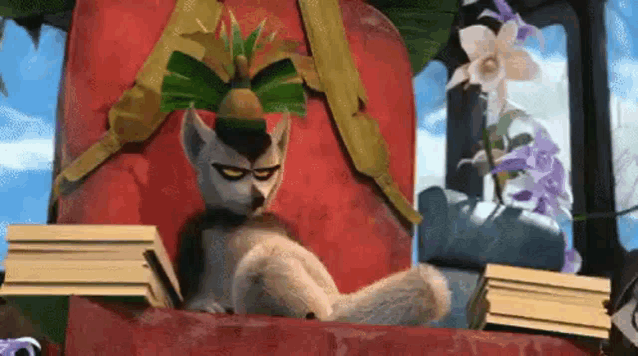 a cartoon lemur is sitting on a red chair with a stack of books .
