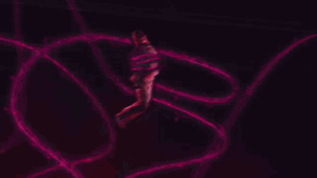 a statue with a red background and a purple glow around it