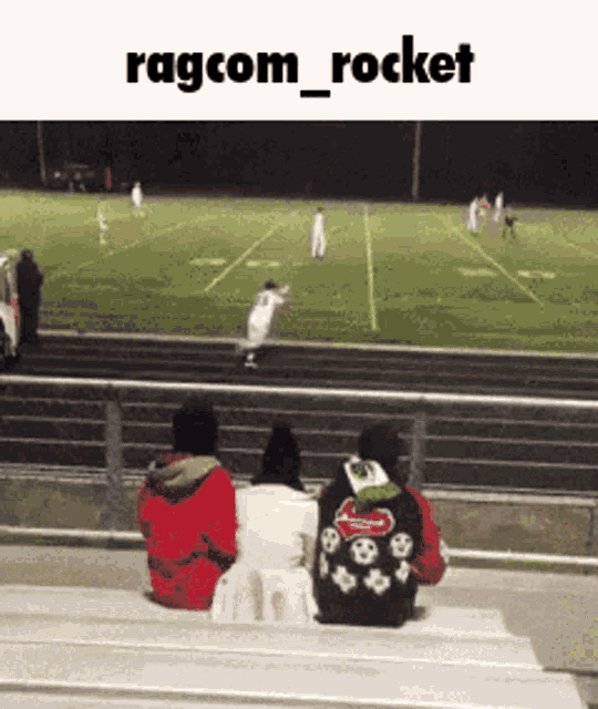 a group of people sitting on bleachers watching a football game with ragcom_rocket written above them