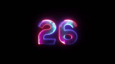 the number 26 is glowing in the dark and changing colors .