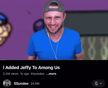 a man in a blue shirt is smiling in front of a cartoon character that says added jeffy to among us on it