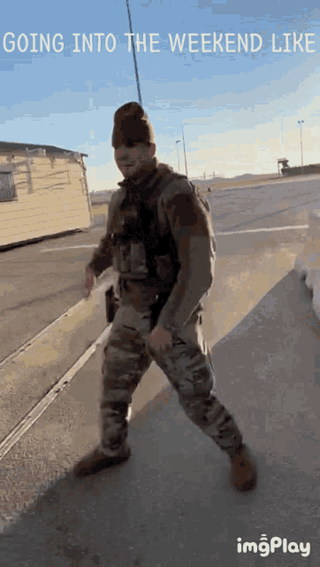 a man in a military uniform is walking down a street with the words going into the weekend like on the bottom