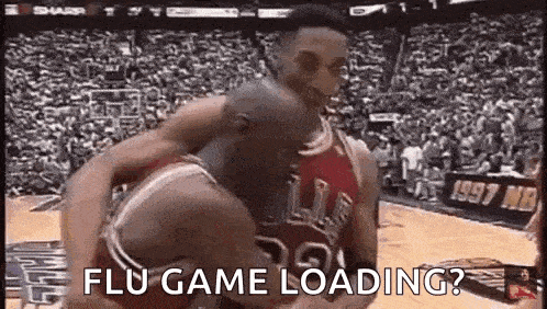 a basketball player is being lifted by another player during a game .